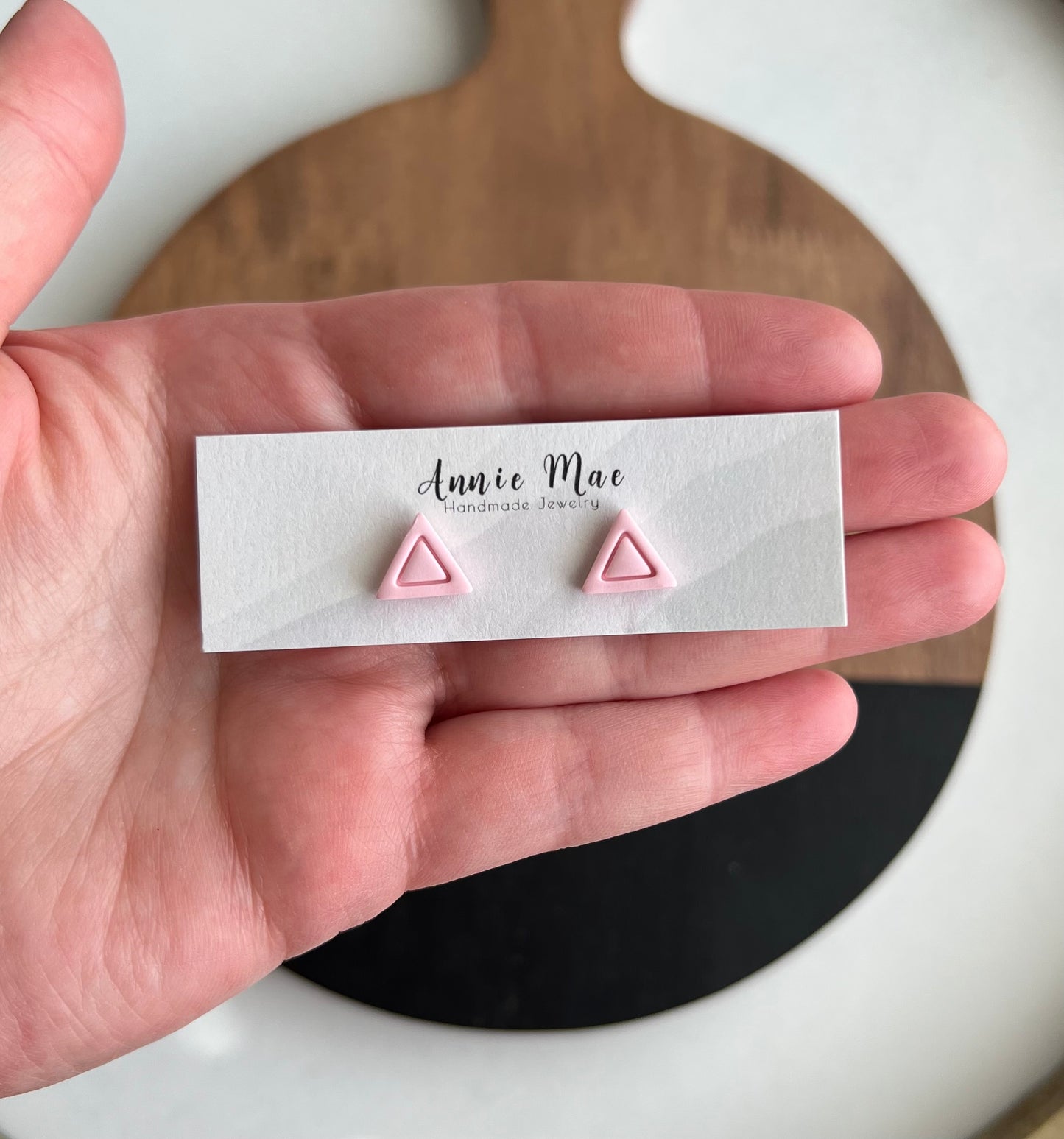 Pink Embossed Triangle Studs